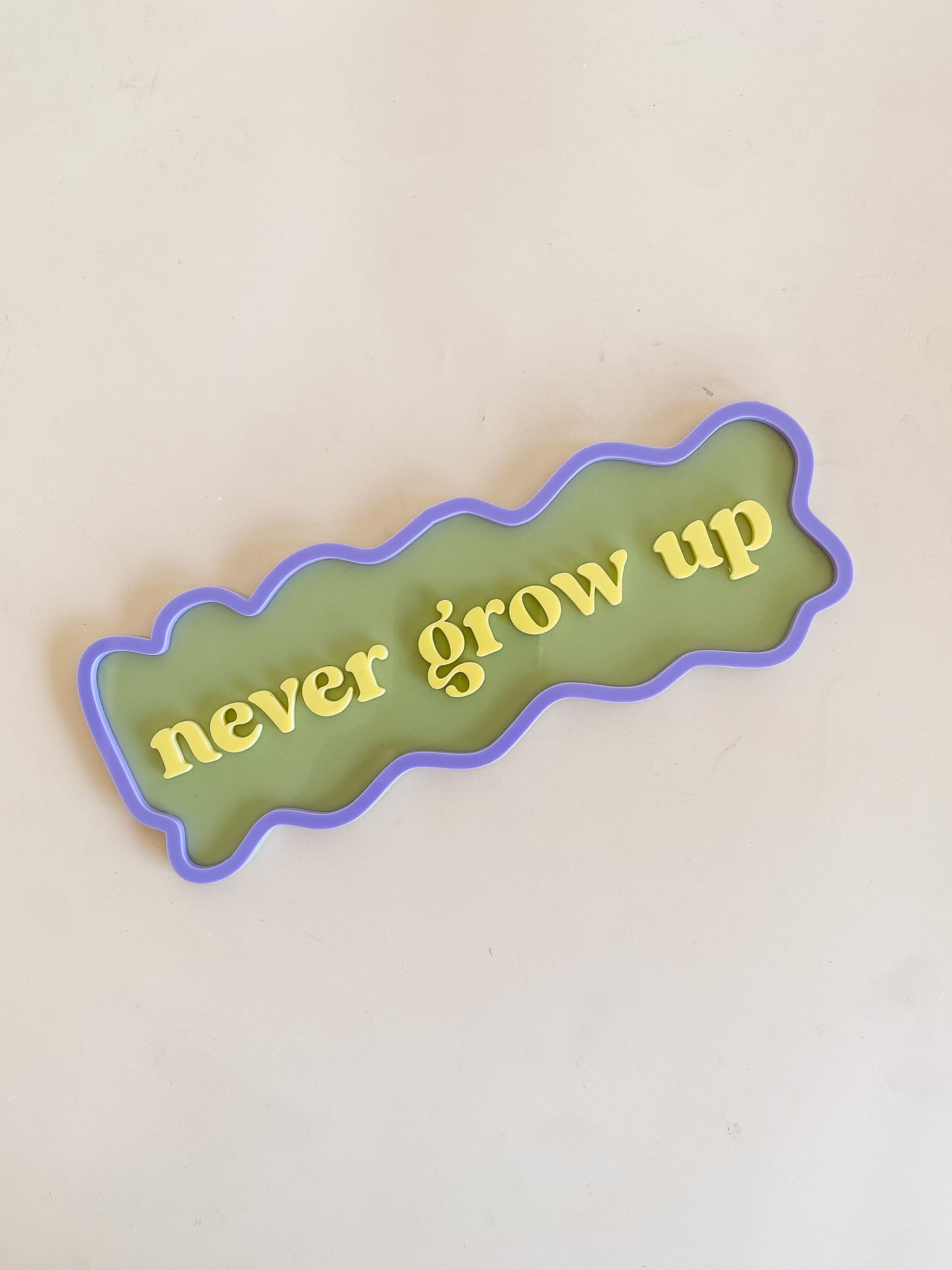 Never Grow Up Wall Sign